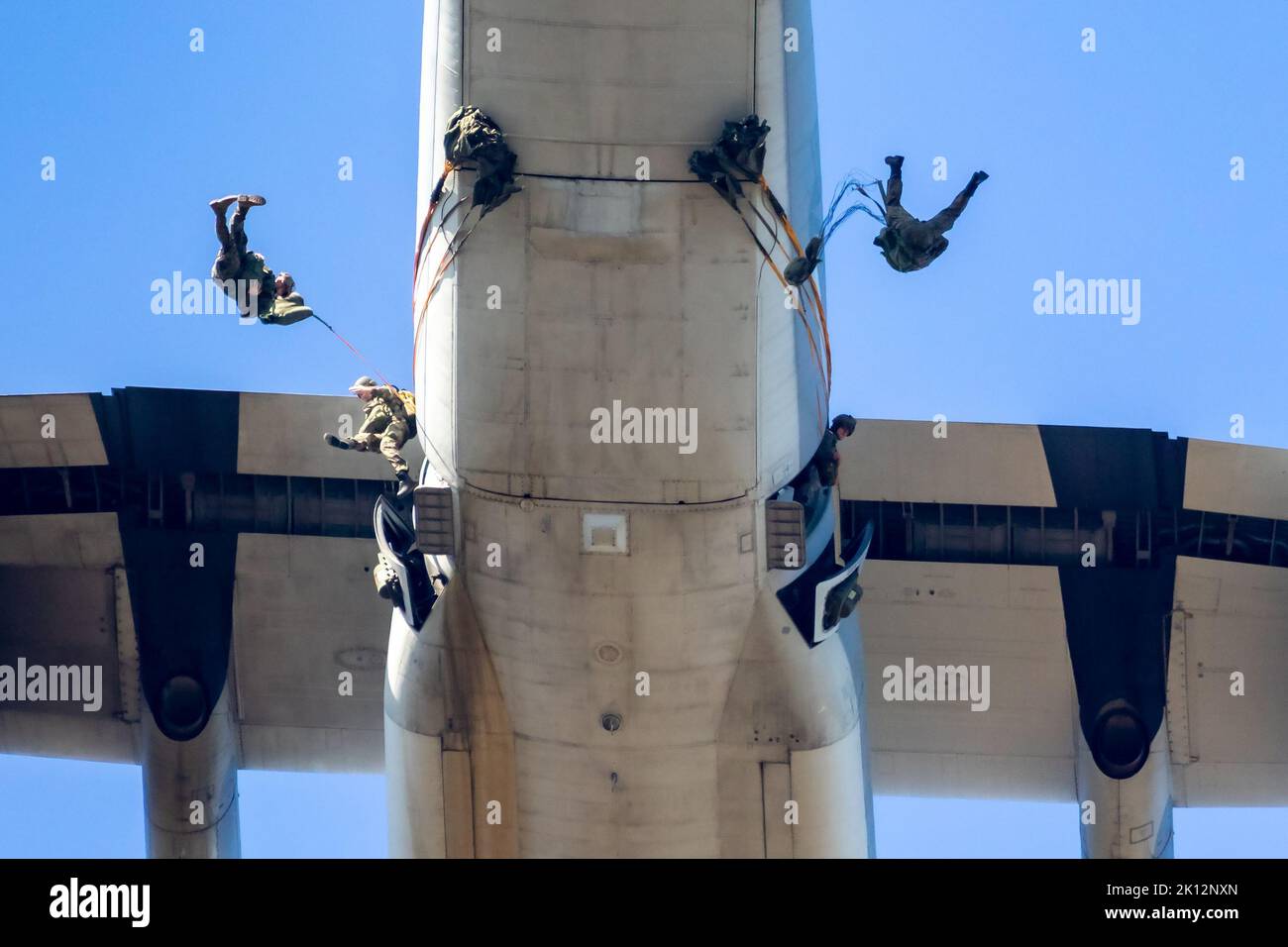 Paratroopers jumping out of a US Marines Lockheed Martin C-130 Hercules transport plane. The Netherlands - September 21, 2019 Stock Photo