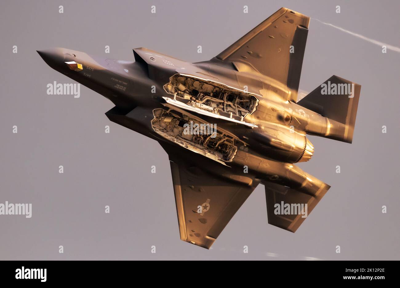 US Air Force Lockheed Martin F-35 Lightning II stealth multirole combat aircraft with open bomb bays flying during the Sanicole Evening Air Show. Belg Stock Photo