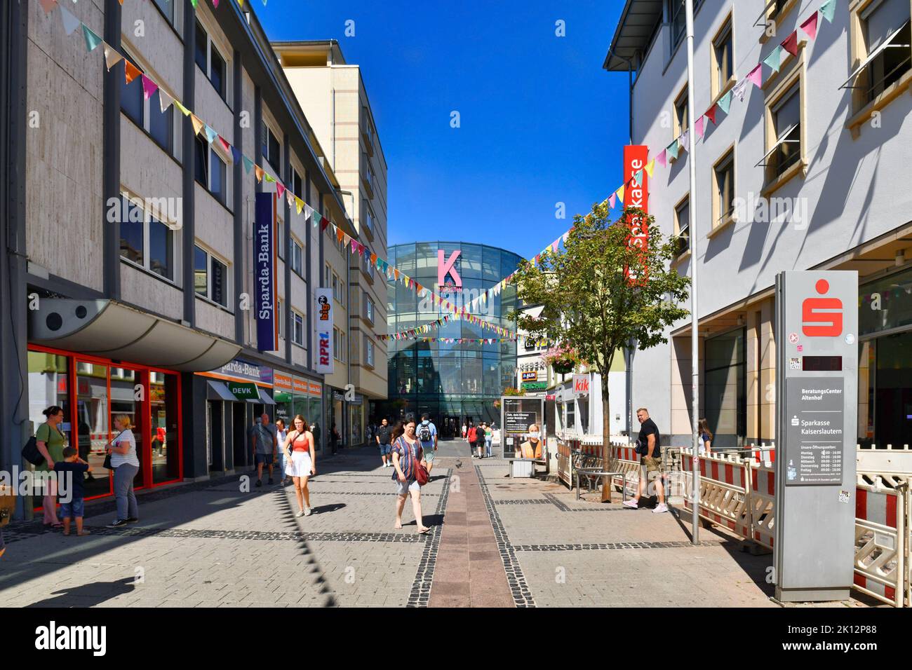 Kaiserslautern, Germany - August 2022: Shopping street called 'Fackelstrasse' with people and shopping center called 'K' in city center Stock Photo
