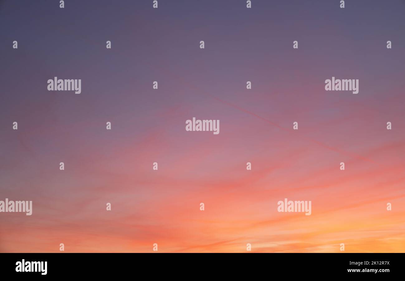 Evening sky with pastel-colored clouds Stock Photo