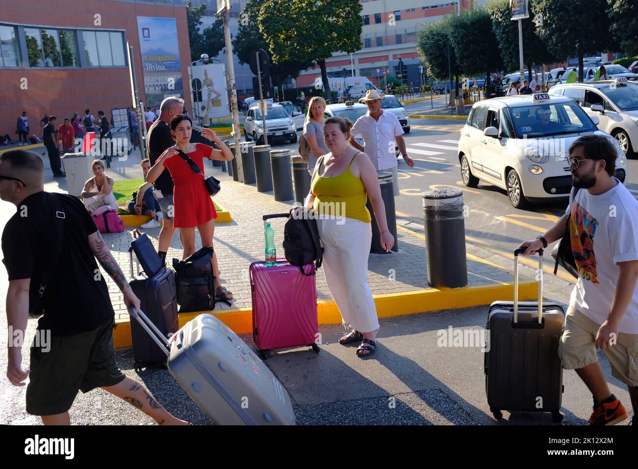 People outside Naples, Napoli airport Stock Photo