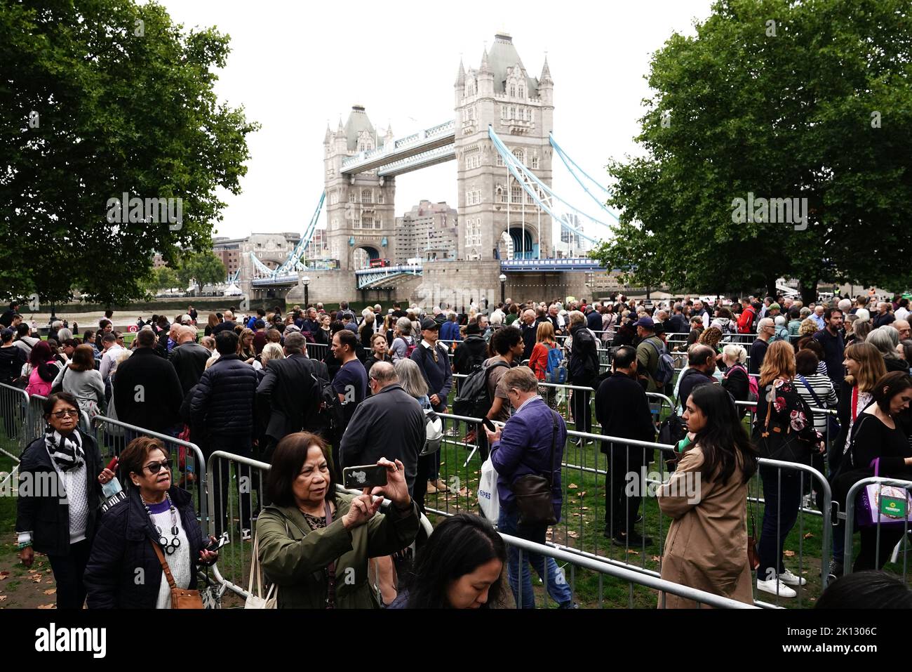 Members of the public in the queue on in Potters Fields Park, central