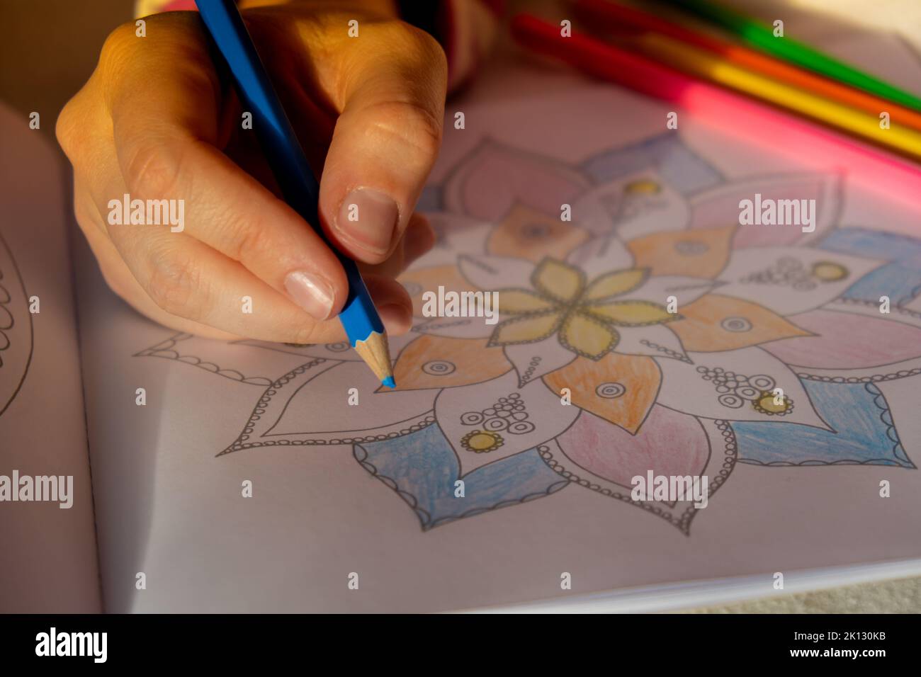Woman coloring antistress page. Female hand painting mandala. Female ...