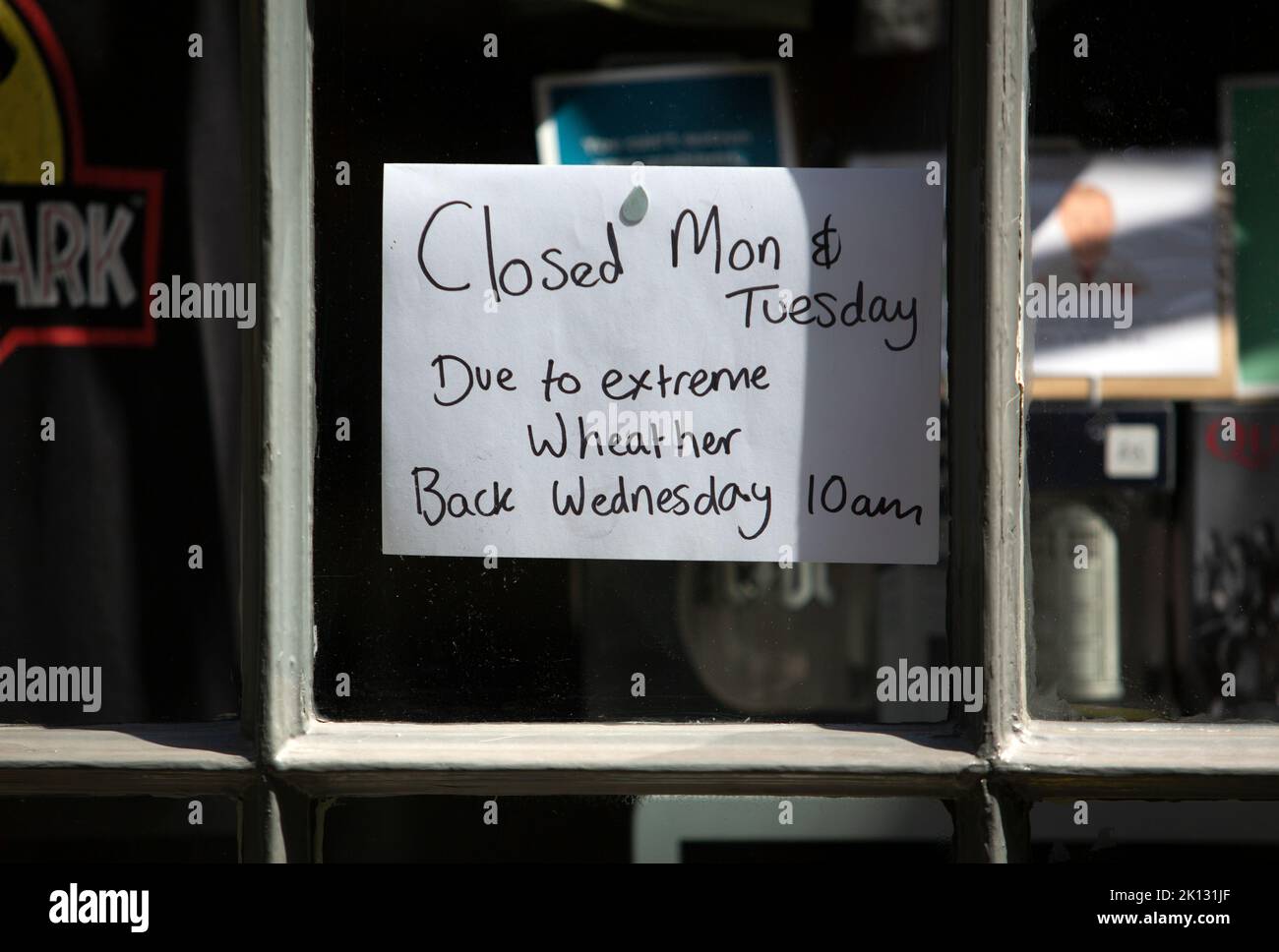 Some shops shutting early in York due to the heat as people in the city of York, North Yorkshire endure the hottest day on record as the temperature i Stock Photo