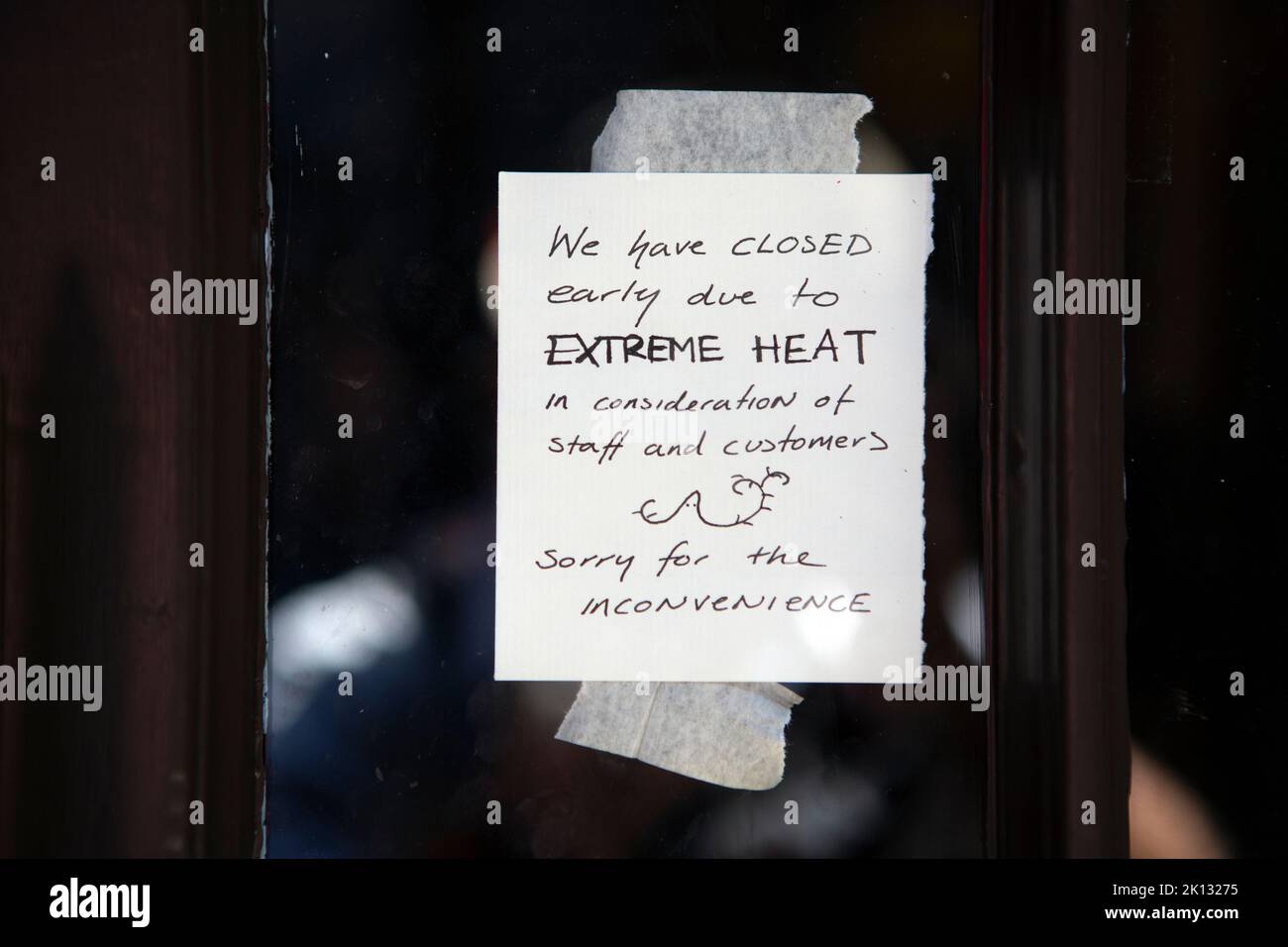 The York Ghost Mercahnts shop on the Shambles closes early due to the heat as people in the city of York, North Yorkshire endure the hottest day on re Stock Photo