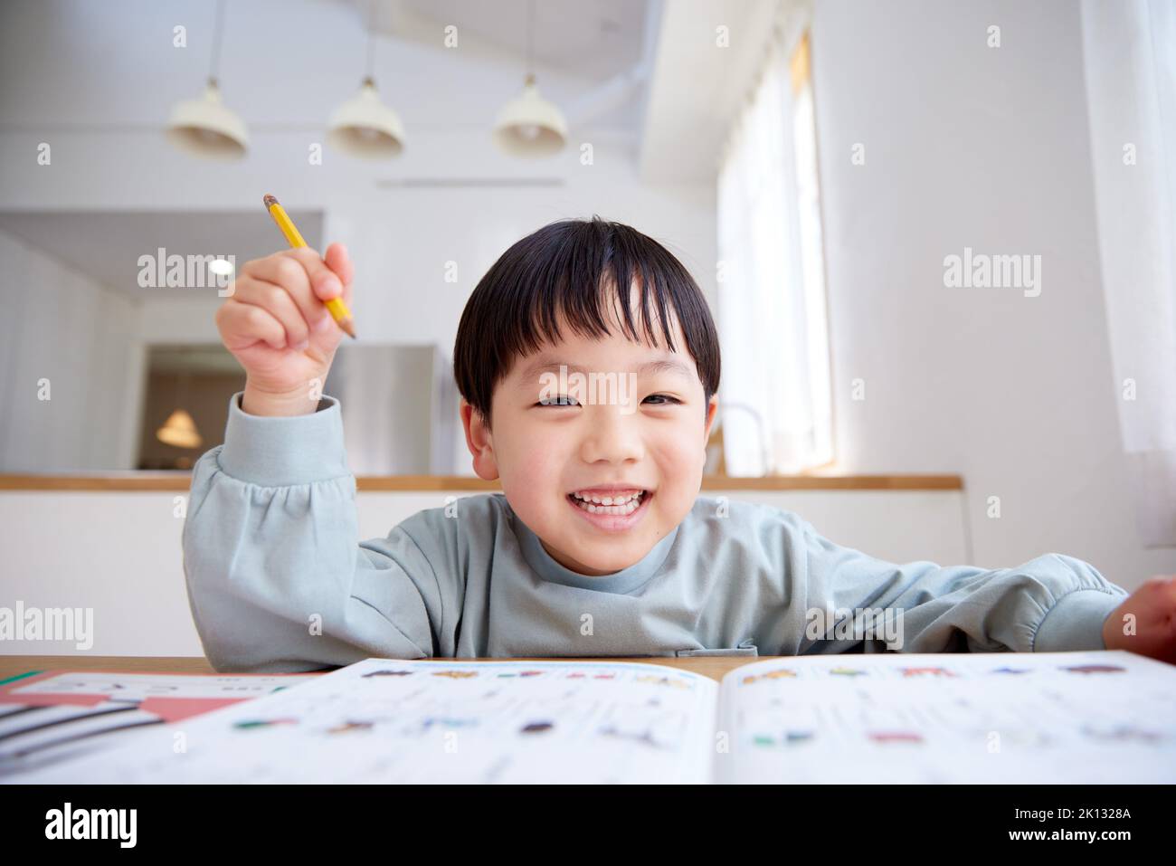Japanese kid studying Stock Photo