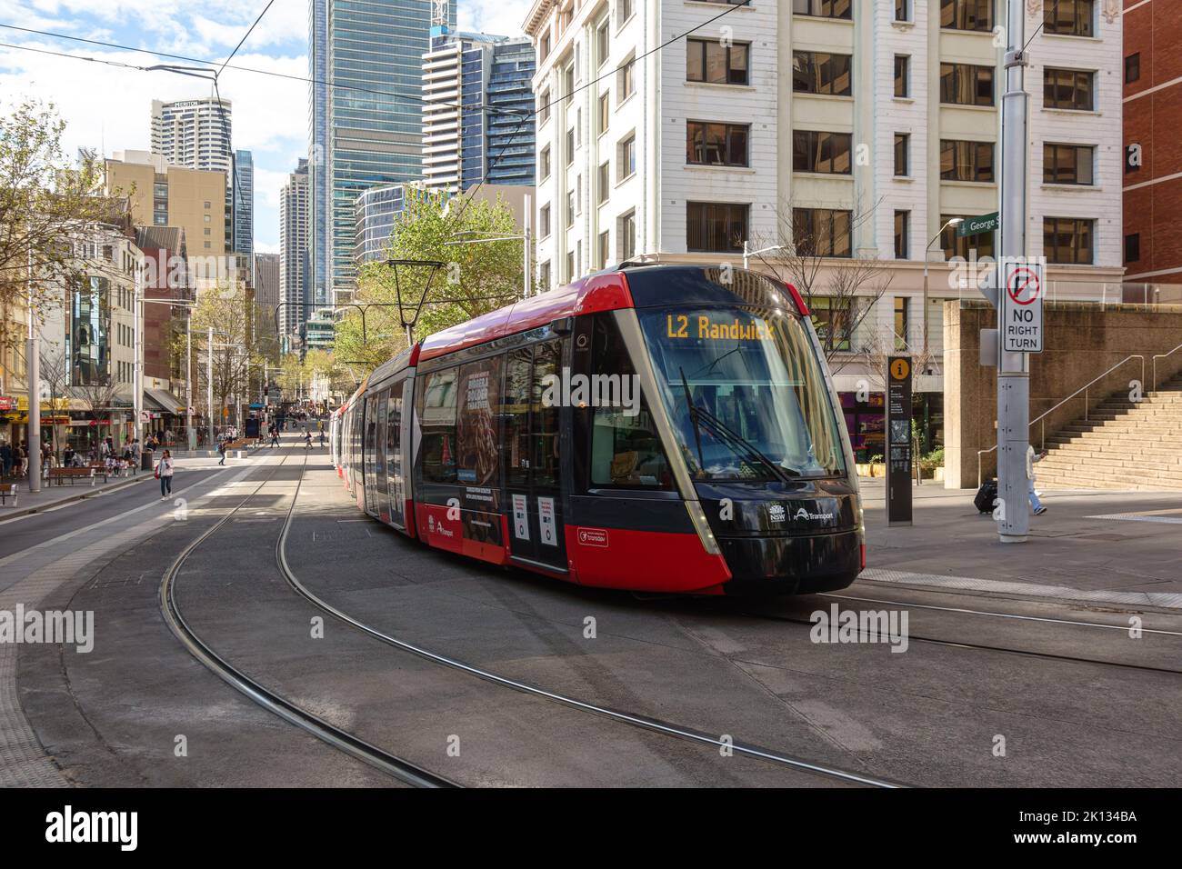 A light rail tram in Sydney on street heading south Stock Photo