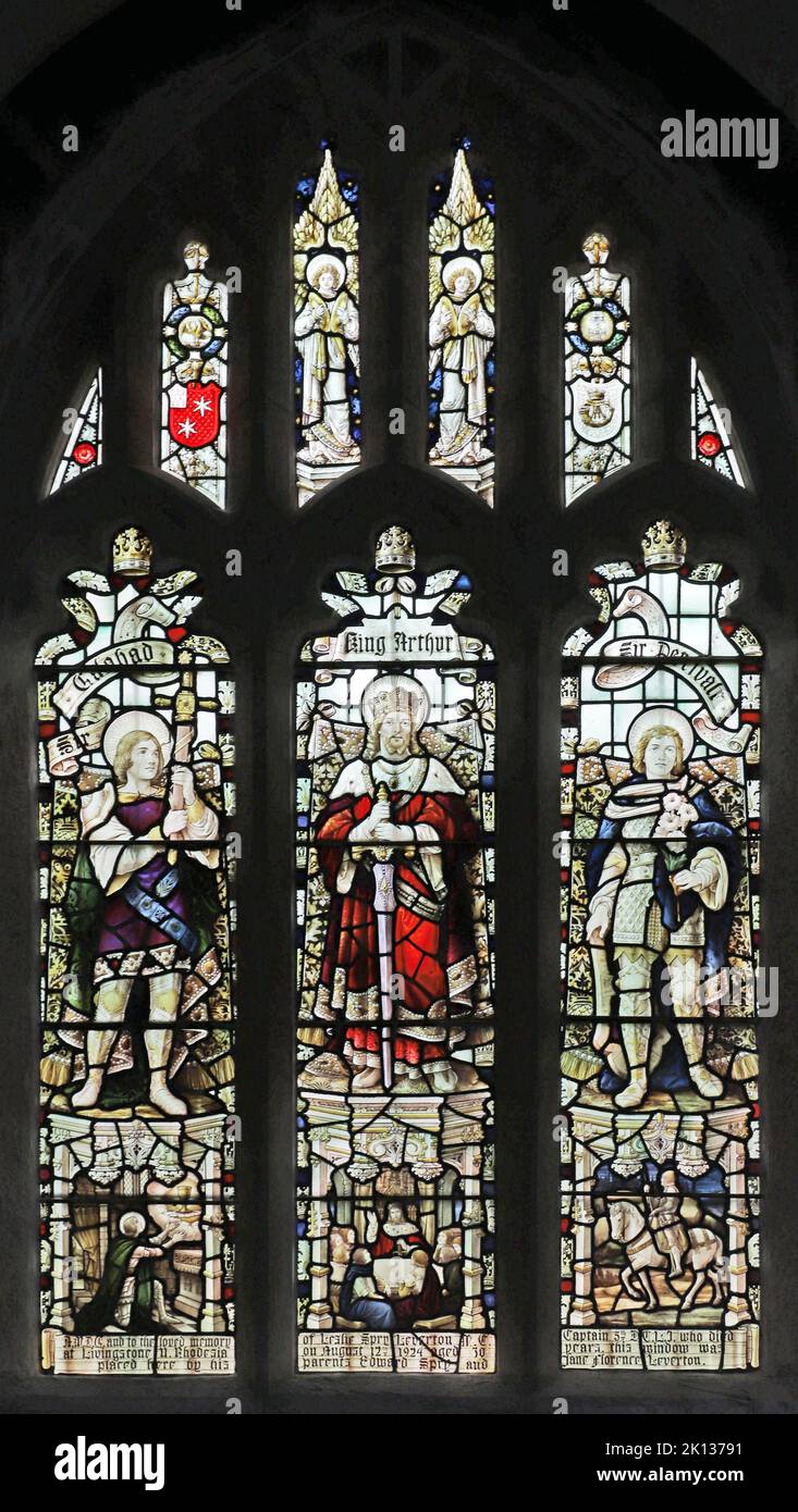 Stained glass window by Percy Bacon & Brothers depicting Sir Galahad, King Arthur and Sir Percival, St Lalluwy, Menheniot, Cornwall Stock Photo