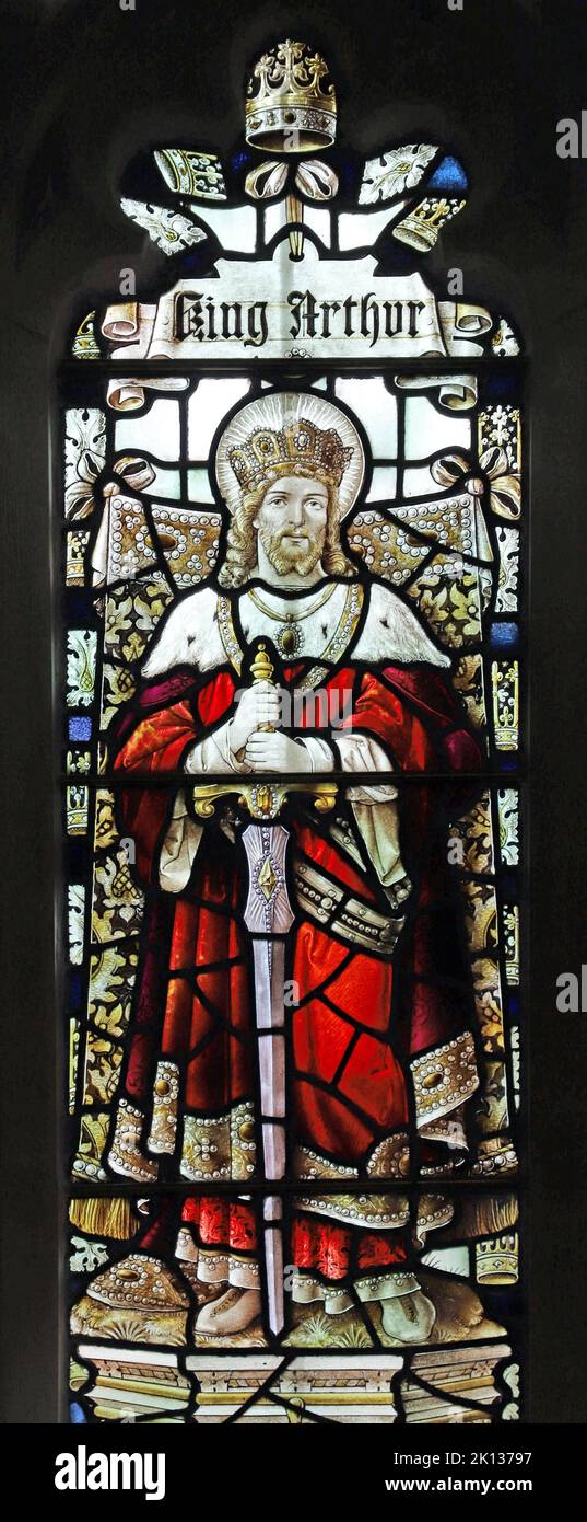 Stained glass window by Percy Bacon & Brothers depicting King Arthur, St Lalluwy's Church, Menheniot, Cornwall Stock Photo