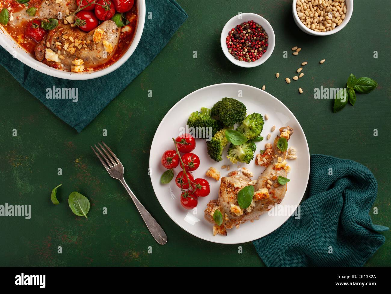 chicken legs backed with feta cheese tomatoes and broccoli, healthy