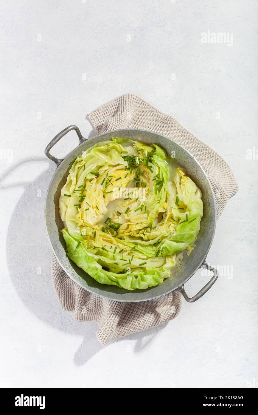 stewed steamed cabbage with butter, healthy vegetarian food Stock Photo