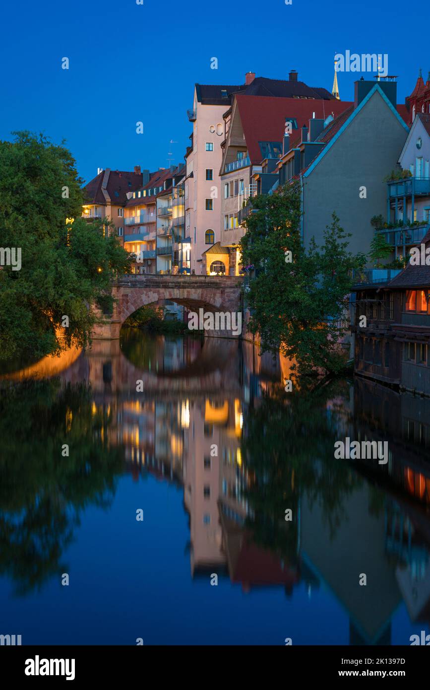 Residential buildings along Pegnitz River seen from Henkersteg bridge, Nuremberg, Bavaria, Germany, Europe Stock Photo