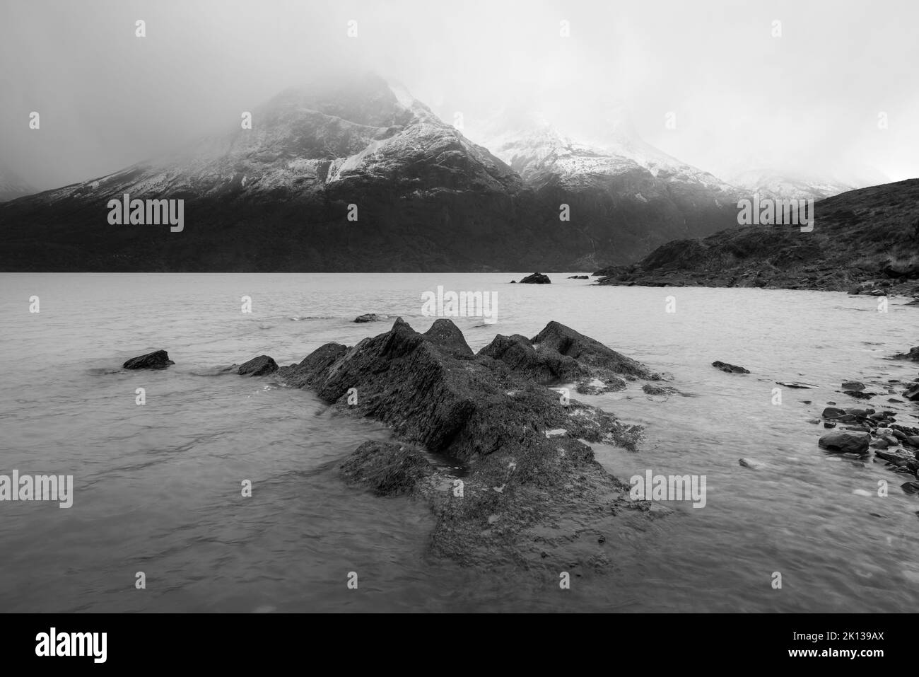 Los Cuernos peaks hiding in fog, Torres del Paine National Park, Patagonia, Chile, South America Stock Photo