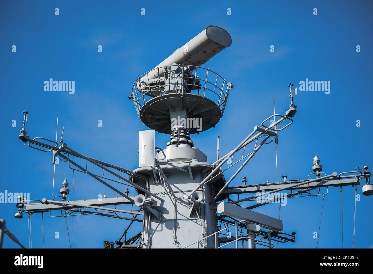 Image of a military radar air surveillance on navy ship tower Stock