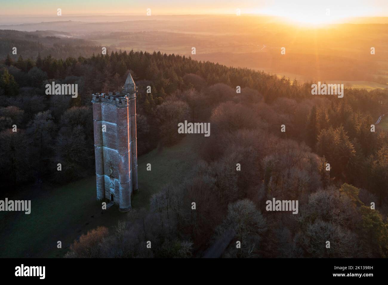 Aerial view of King Alfred's Tower, a folly, at sunset in winter, near Stourhead, Somerset, England, United Kingdom, Europe Stock Photo