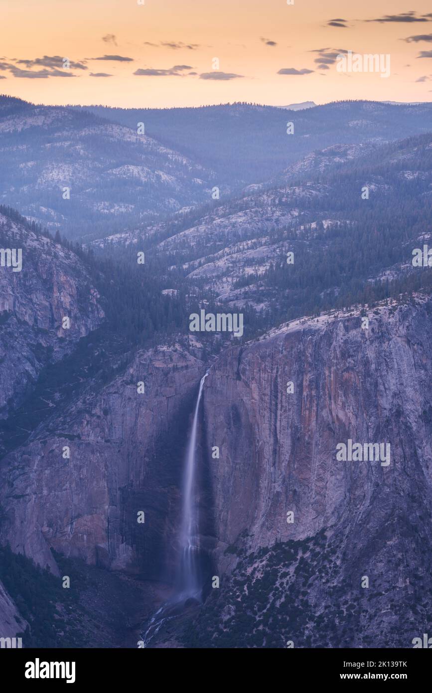 Dusk falls over Yosemite Falls in Yosemite National Park, UNESCO World Heritage Site, California, United States of America, North America Stock Photo