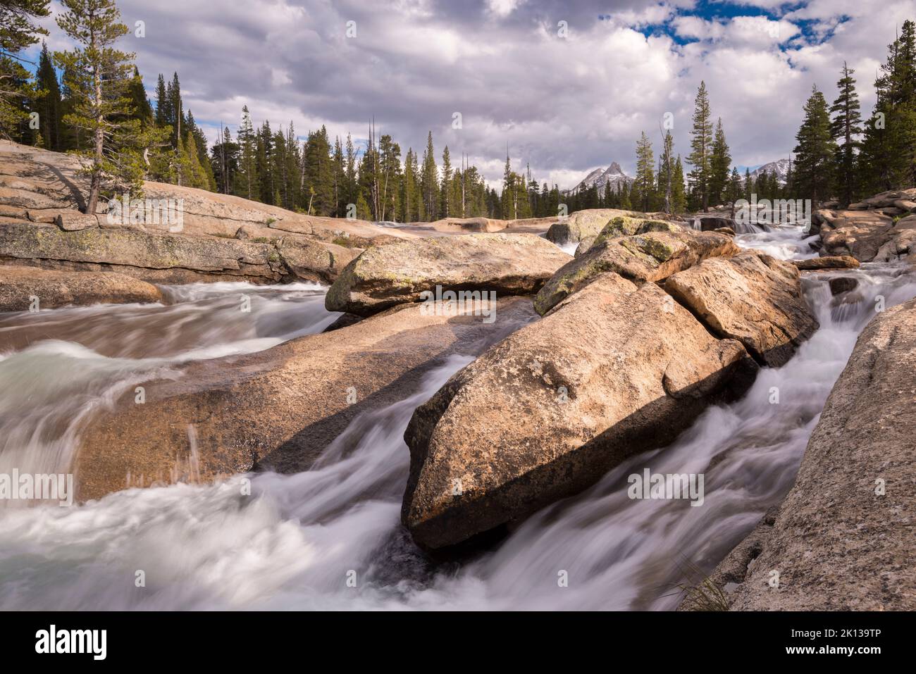 Tuolumne River rushing through granite boulders in Yosemite National Park, UNESCO World Heritage Site, California, United States of America Stock Photo