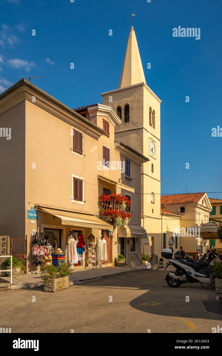 View of St. George's Church and shops in Lovran village, Lovran, Kvarner Bay, Eastern Istria, Croatia, Europe Stock Photo