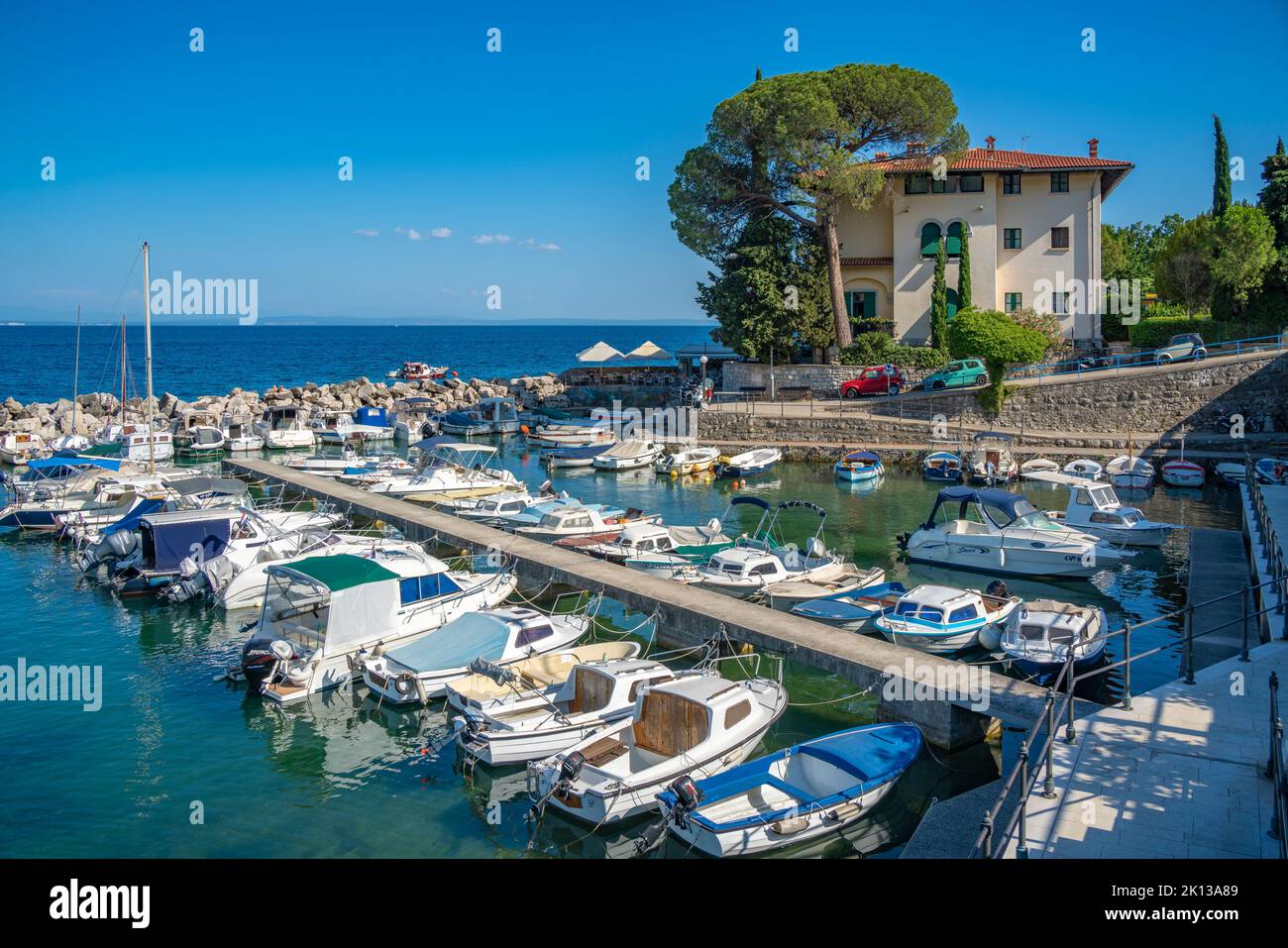 View of boats in the marina and Adriatic Sea at Icici, Icici, Kvarner Bay, Croatia, Europe Stock Photo