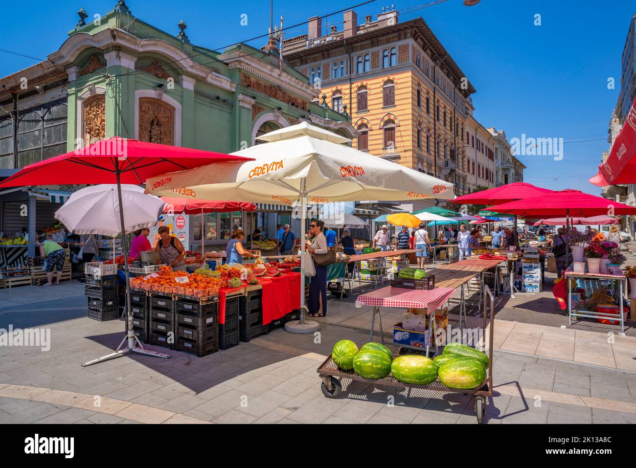 View of fruit and vegetable stall and exterior of ornate Central Market building, Rijeka, Croatia, Europe Stock Photo