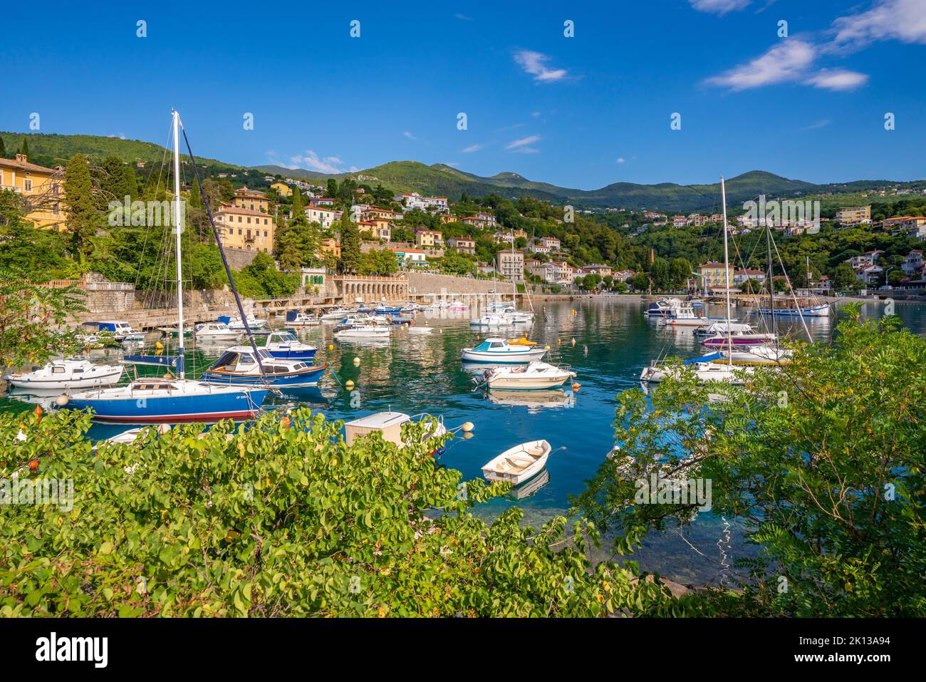View of boats in the bay at Ika, Kvarner Bay, Eastern Istria, Croatia, Europe Stock Photo