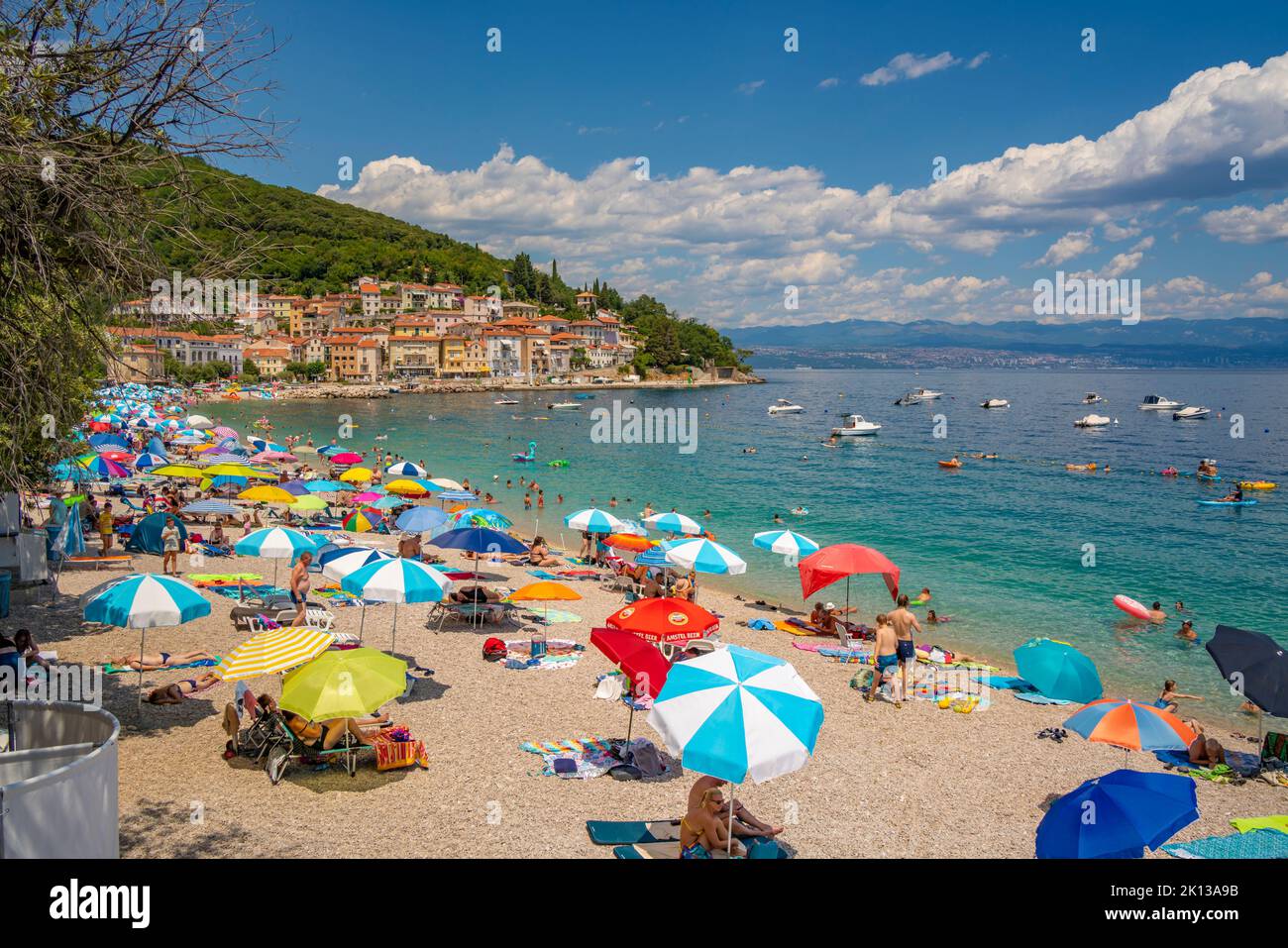 View of beach and the town in the background in Moscenicka Draga, Kvarner Bay, Eastern Istria, Croatia, Europe Stock Photo