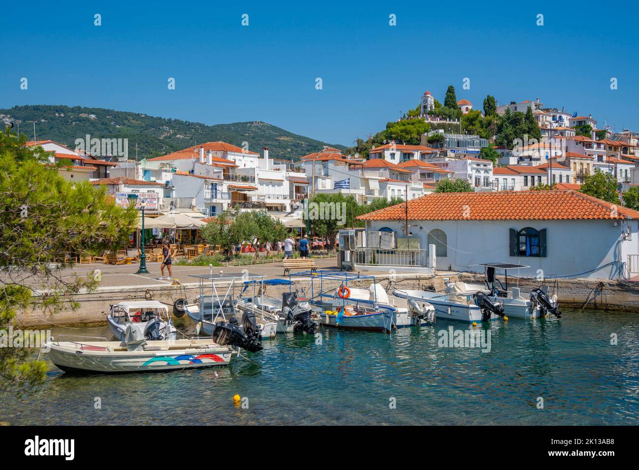 View of Skiathos Town overlooked by Greek Orthodox Church, Skiathos Island, Sporades Islands, Greek Islands, Greece, Europe Stock Photo