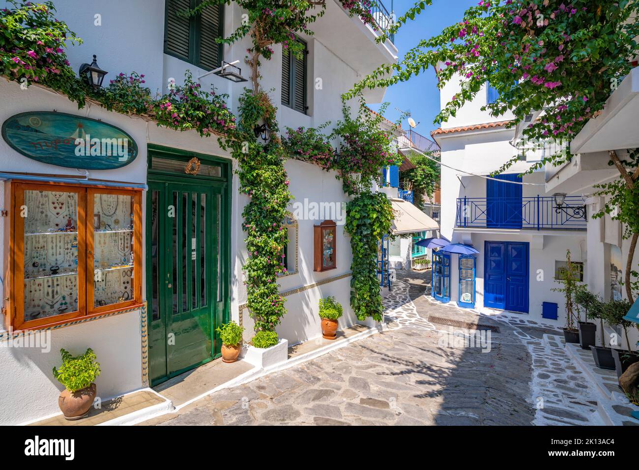 View of narrow whitewashed street in Skiathos Town, Skiathos Island, Sporades Islands, Greek Islands, Greece, Europe Stock Photo
