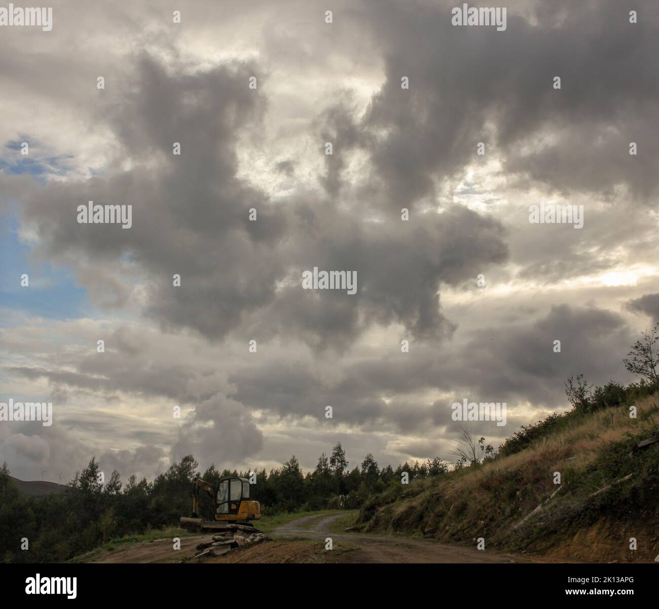 Cloudy sky with mountain forest hi-res stock photography and images - Alamy