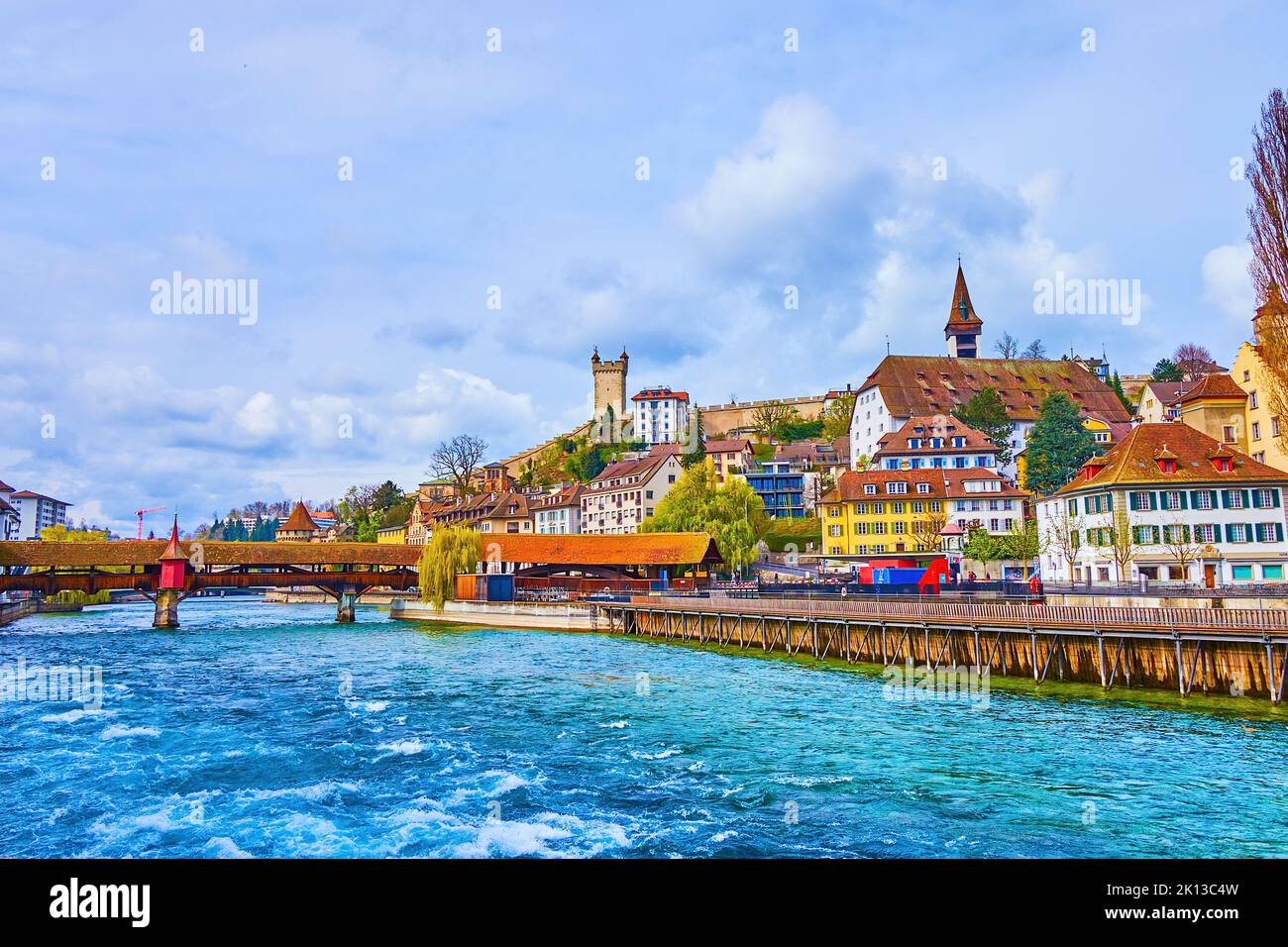 Old townhouses, medieval Spreuerbrucke and Musegg wall fortification ...