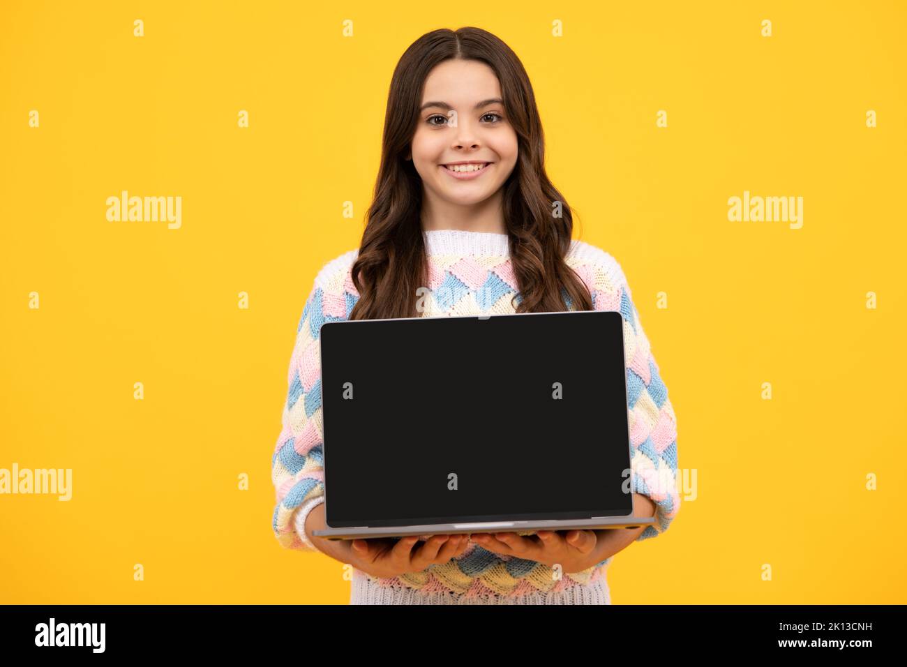 Student teenager schoolgirl with laptop on isolated background. Screen ...