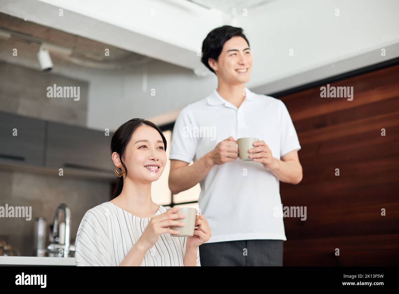 Japanese couple in the kitchen Stock Photo