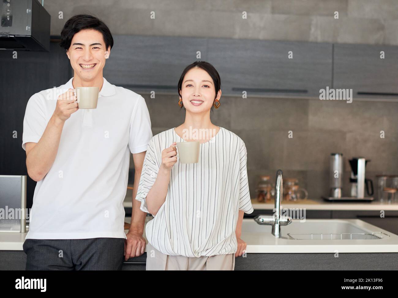 Japanese couple in the kitchen Stock Photo