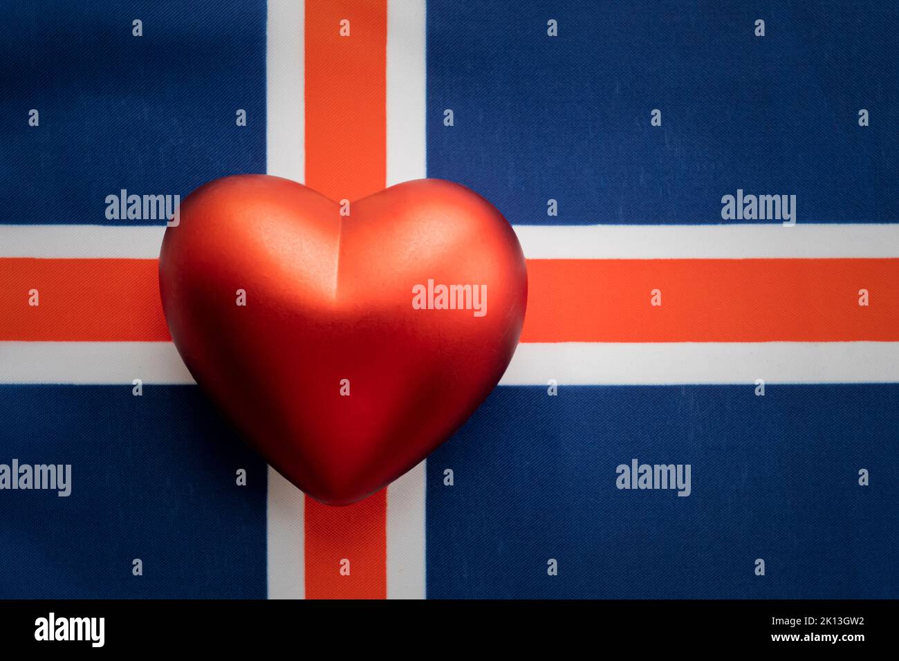 The red heart is on the flag of iceland . The concept of patriotic feelings for one's state. Patriotism Stock Photo