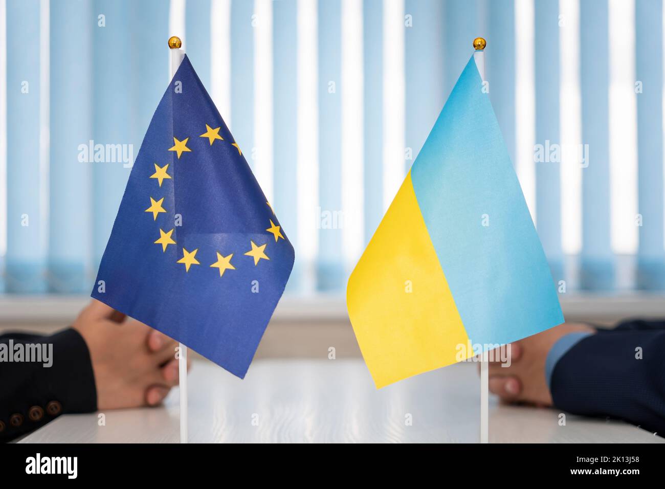 Political flags of Ukraine and European Union.. concept of negotiations, collaboration and cooperation of countries. agreement between the governments Stock Photo