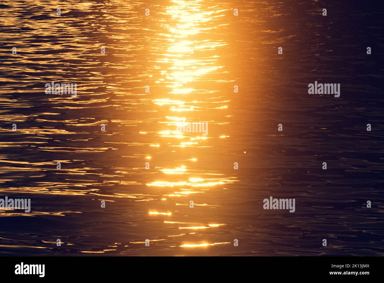 A closeup shot of the sun reflecting on a sea surface Stock Photo - Alamy