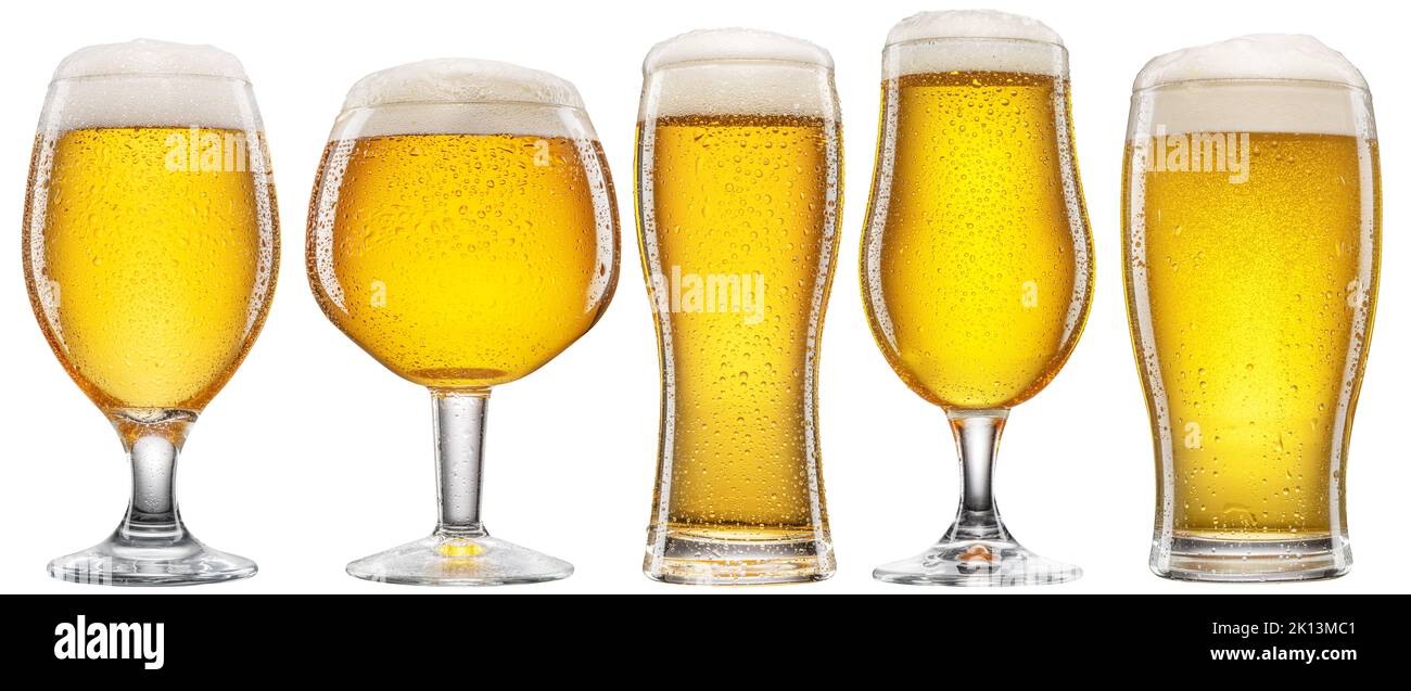 Five different glasses with light beer and with drops on the surface isolated on a white background. Beer concept. Clipping path. Stock Photo