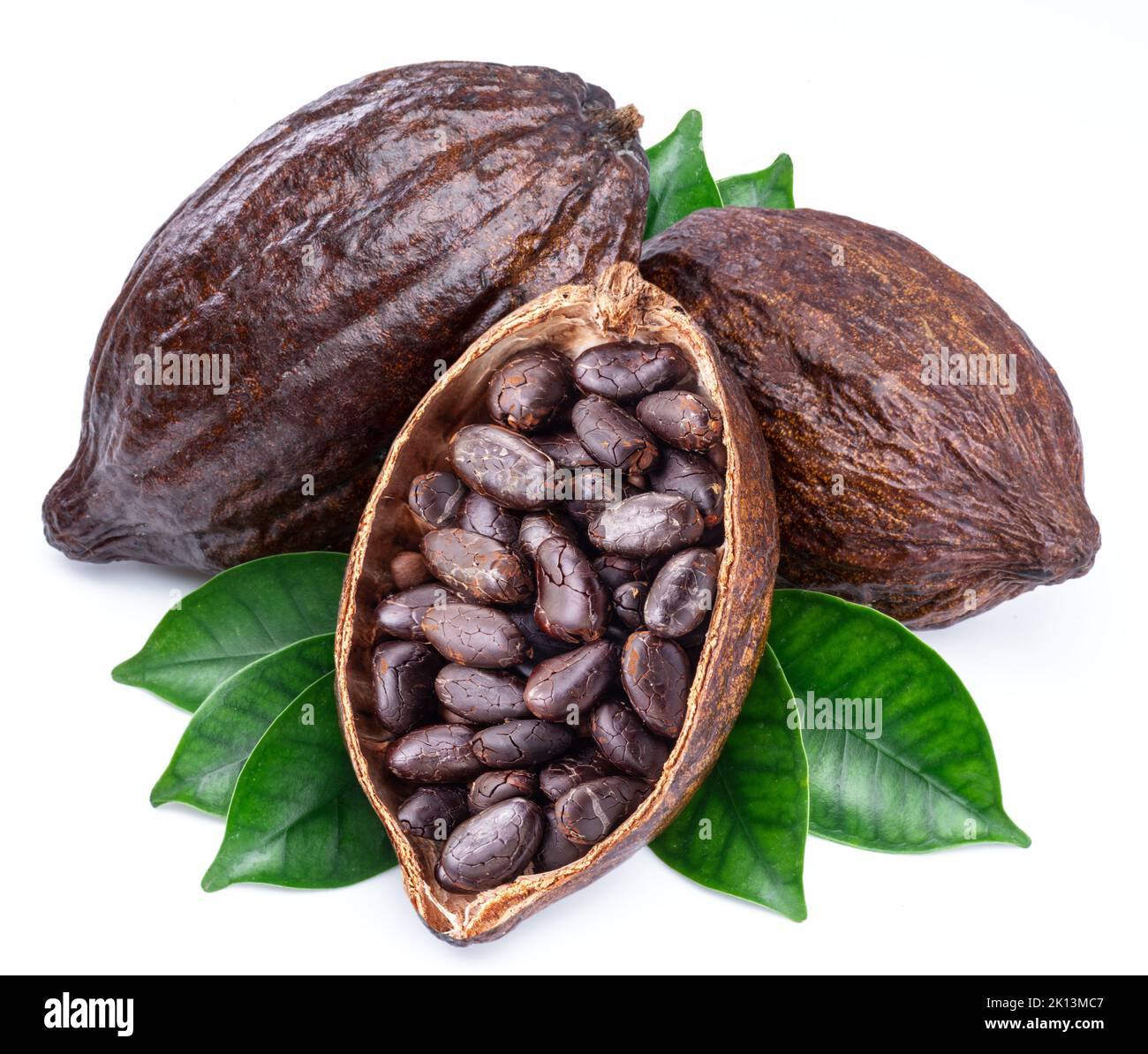 Cocoa pods with cocoa leaves and beans isolated on a white background. Stock Photo