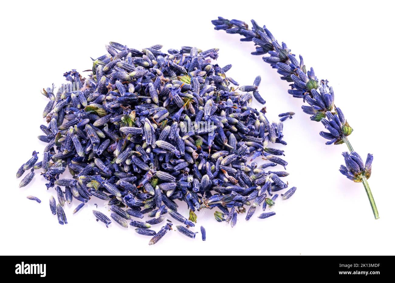 Heap of lavender flower buds closeup isolated on white background. Top view. Stock Photo