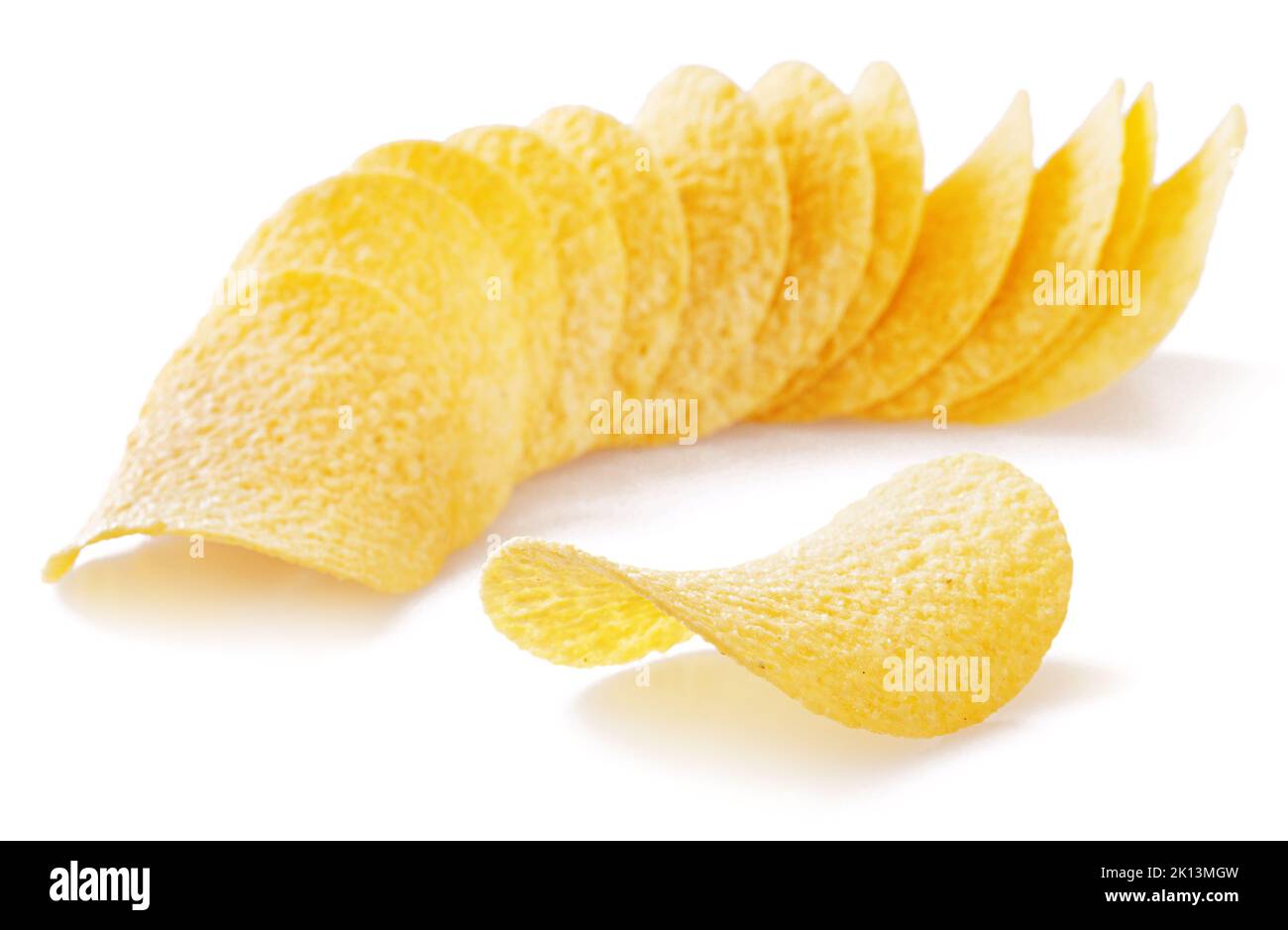 Delicious potato chips isolated on white background. Stock Photo
