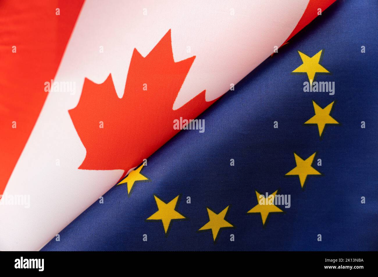 Flags European Union and canada. The concept of international relations between countries. The state of governments. Stock Photo