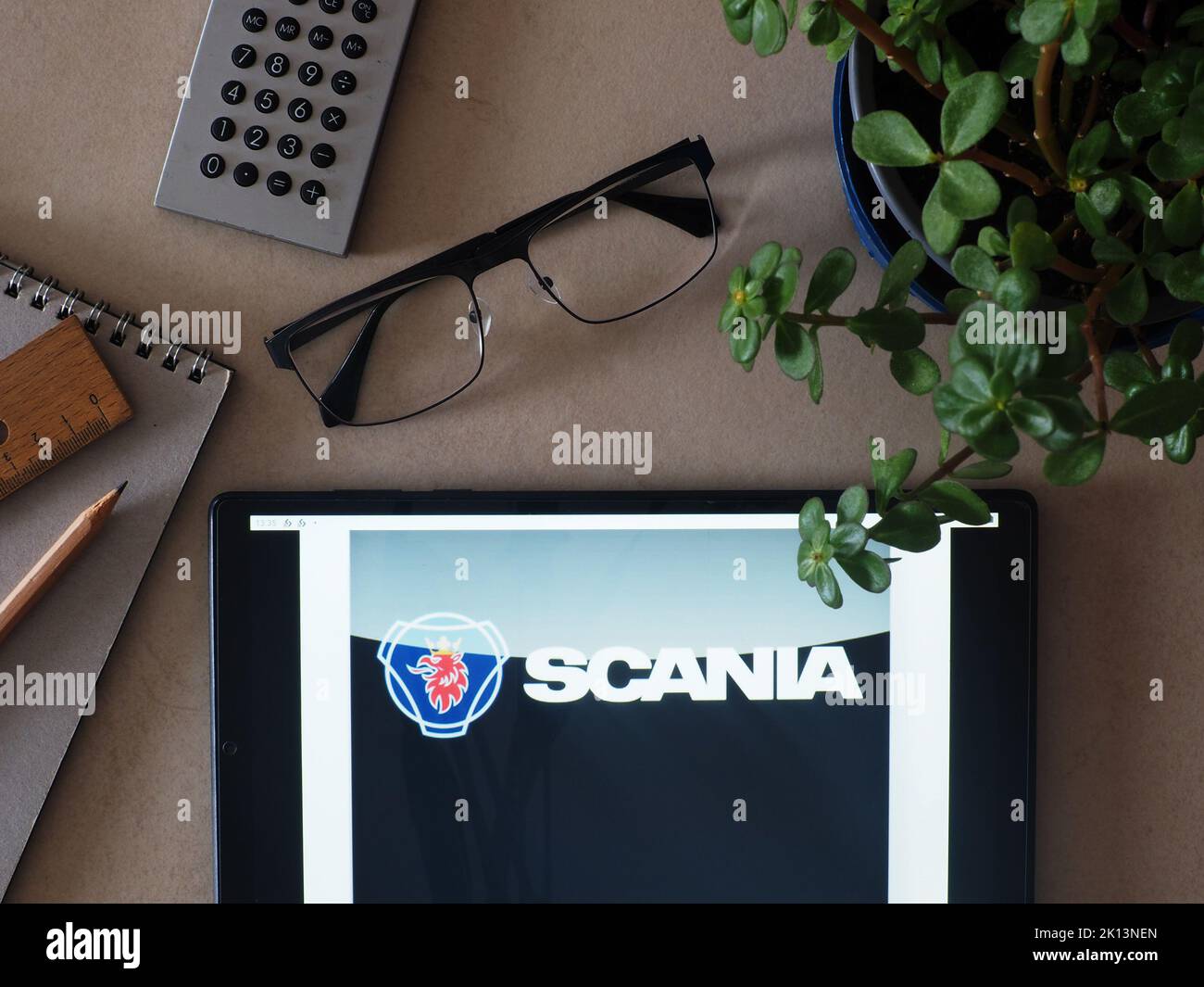 In this photo illustration, Scania brand of Traton Group logo seen displayed on a tablet Stock Photo