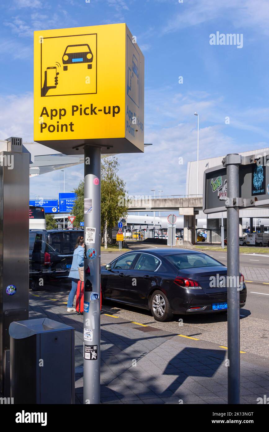 Sign for the App pickup point, Schiphol Airport, Netherlands Stock
