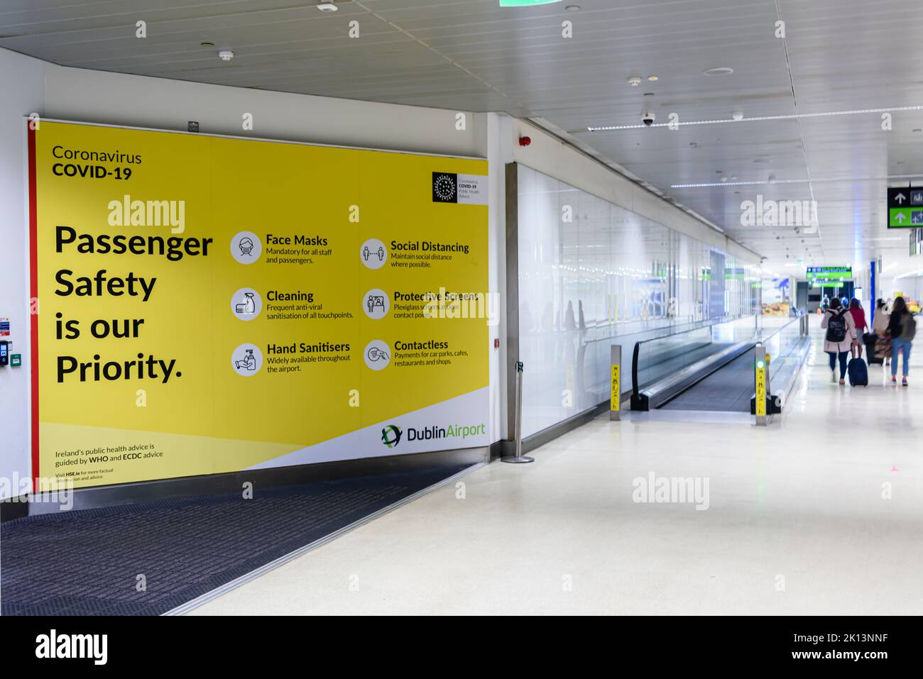 Sign advising passengers about COVID19 precautions including face