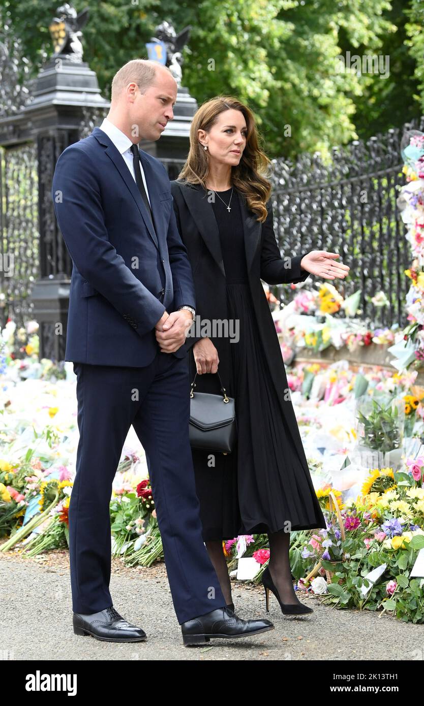 The Prince and Princess of Wales view floral tributes left by members of the public at the gates of Sandringham House in Norfolk, following the death of Queen Elizabeth II. Picture date: Thursday September 15, 2022. Stock Photo