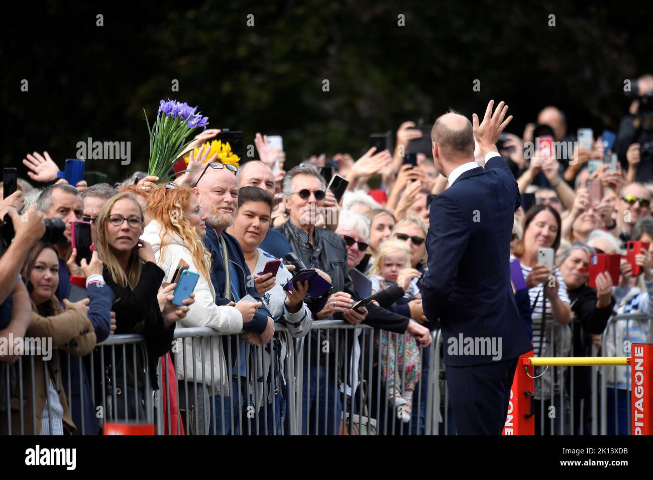The Prince of Wales meeting wellwishers as he views floral tributes left by members of the public at the gates of Sandringham House in Norfolk, following the death of Queen Elizabeth II. Picture date: Thursday September 15, 2022. Stock Photo