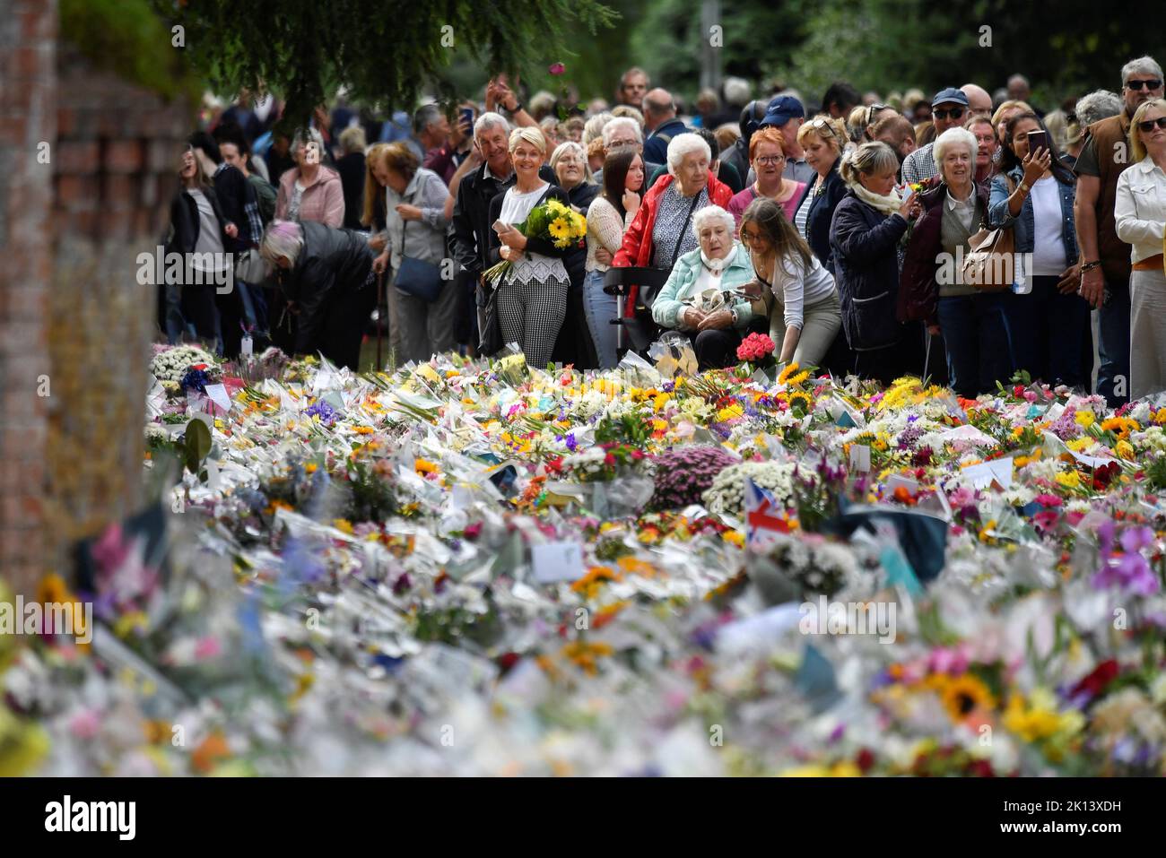 Floral tributes left by members of the public at the gates of Sandringham House in Norfolk, following the death of Queen Elizabeth II. Picture date: Thursday September 15, 2022. Stock Photo