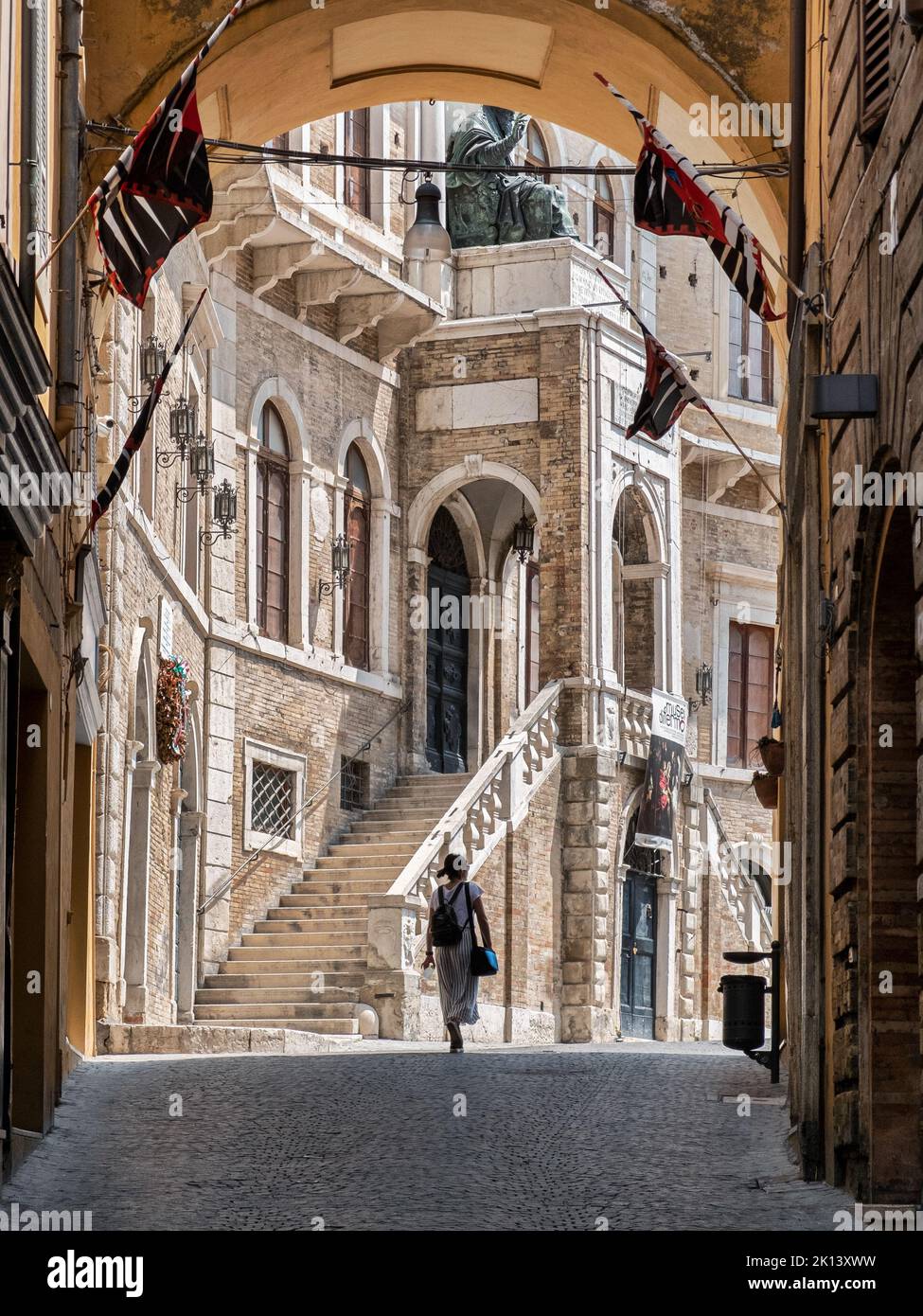 Fermo, Marche, Italy. Medieval Priory Palace seen from the vault that leads to Piazza del Popolo in Fermo. Stock Photo