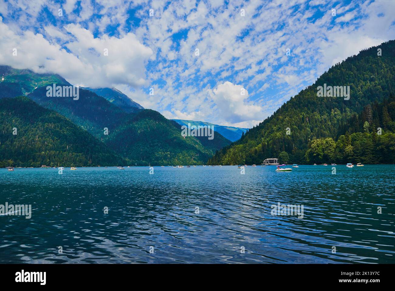 Lake Ritsa is a lake in the Caucasus Mountains in Abkhazia region. Summer bright landscape. Stock Photo