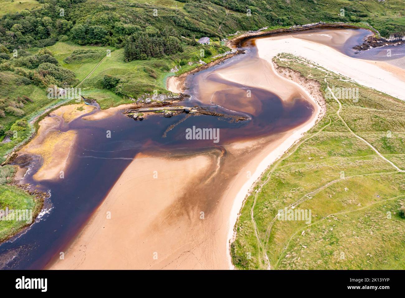Aerial of the mouth of the Fintragh river at Fintra beach by Killybegs, County Donegal, Ireland. Stock Photo